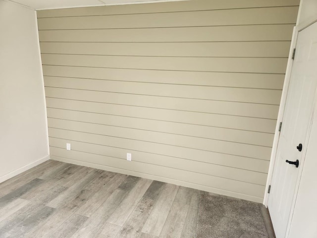 613 Saddle Rdg, Portage, WI 53901 - spare room with baseboards and wood finished floors