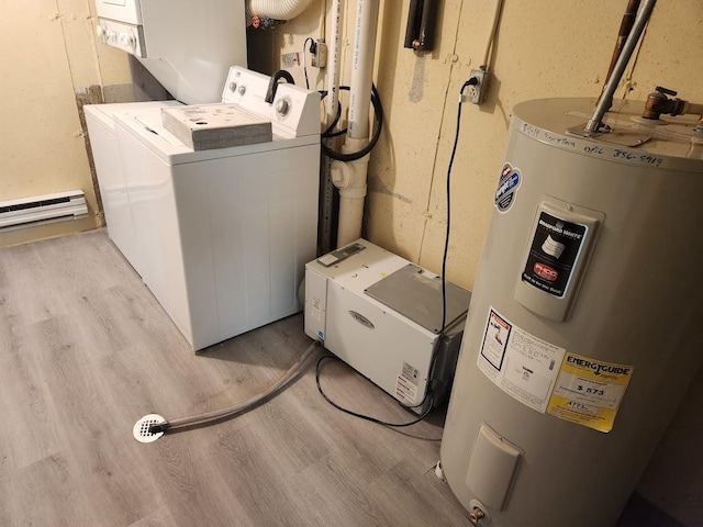 613 Saddle Rdg, Portage, WI 53901 - laundry room with laundry area, wood finished floors, electric water heater, and a baseboard radiator