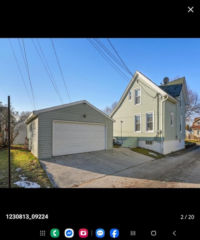 2317 S 9th St, Sheboygan, WI 53081 - view of property exterior with a garage and an outdoor structure