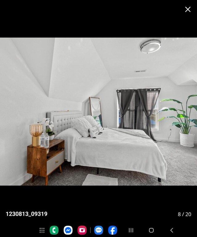 2317 S 9th St, Sheboygan, WI 53081 - carpeted bedroom featuring visible vents, baseboards, and vaulted ceiling