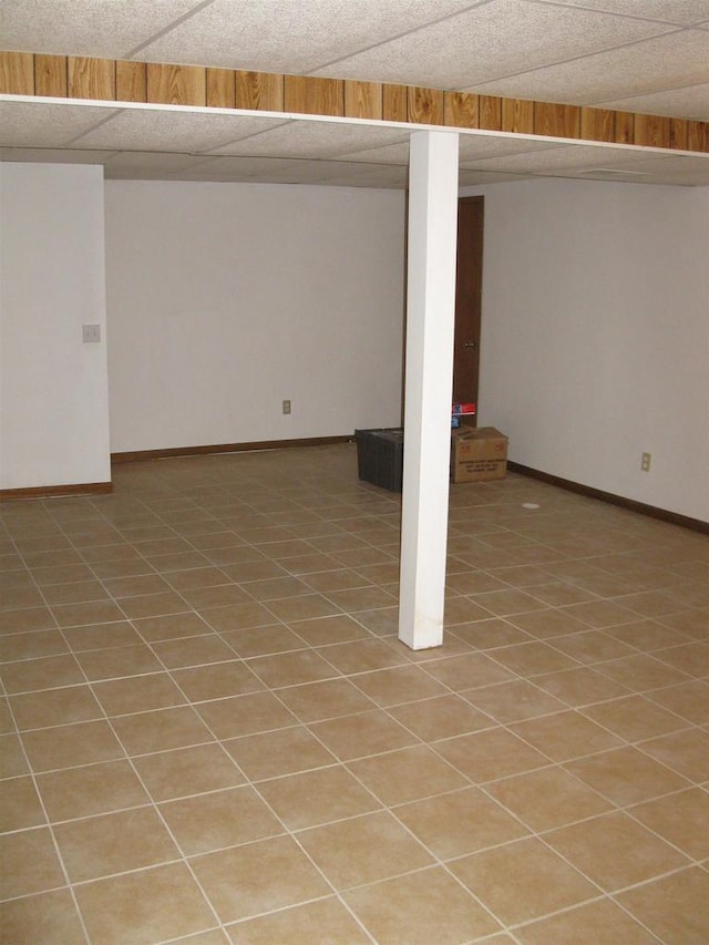 finished basement featuring baseboards
