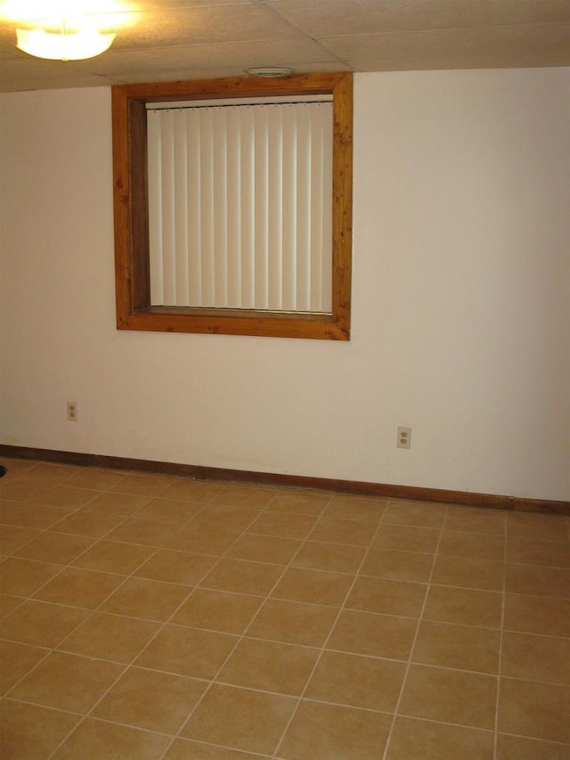 empty room with baseboards