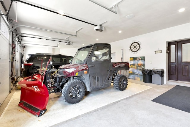 1545 County Rd I, Oshkosh, WI 54902 - garage with recessed lighting and a garage door opener