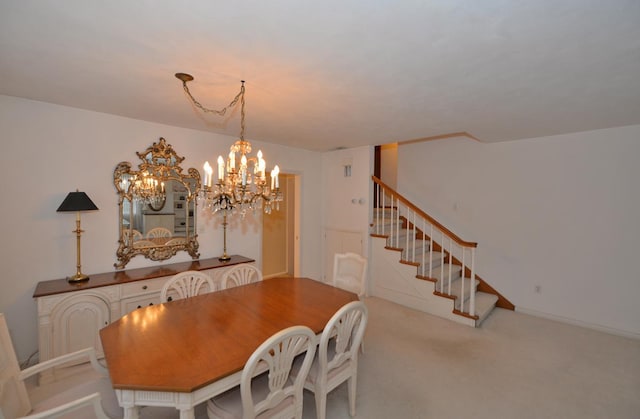 dining area featuring light carpet, stairs, and an inviting chandelier