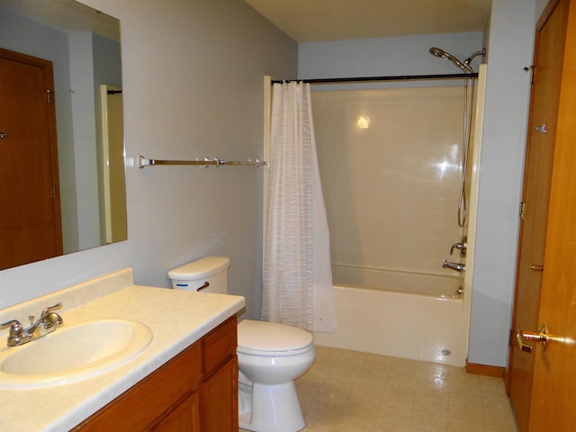 bathroom with toilet, shower / tub combo, and vanity