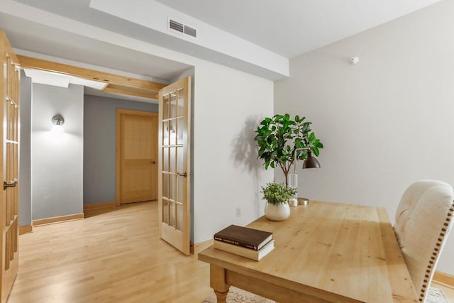 123 W Washington Ave Unit 306, Madison, WI 53703 - home office with light wood-type flooring, baseboards, and french doors