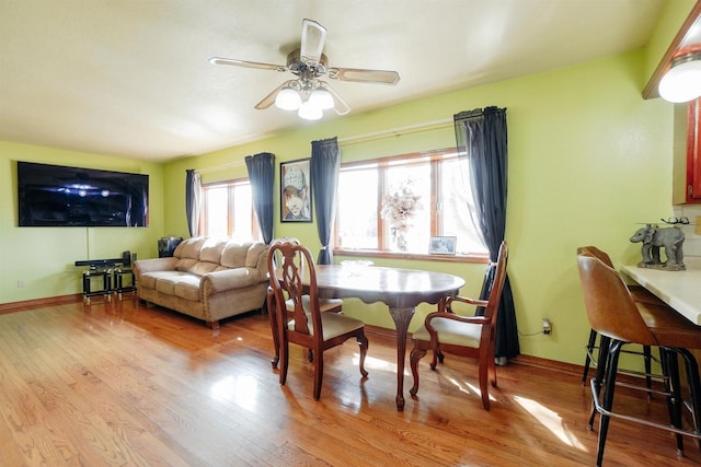 1001 Wisconsin Ave, North Fond Du Lac, WI 54937 - dining room featuring ceiling fan, baseboards, and wood finished floors