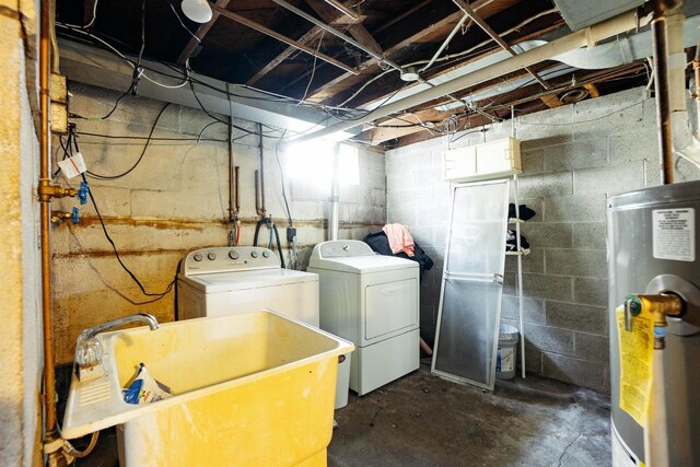 1001 Wisconsin Ave, North Fond Du Lac, WI 54937 - laundry area with water heater, separate washer and dryer, laundry area, and a sink