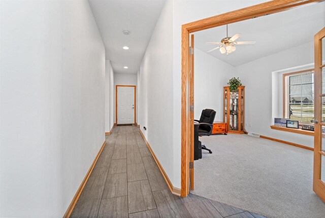 1495 Cattail Ln, Fond Du Lac, WI 54937 - corridor featuring visible vents, baseboards, recessed lighting, vaulted ceiling, and wood finished floors