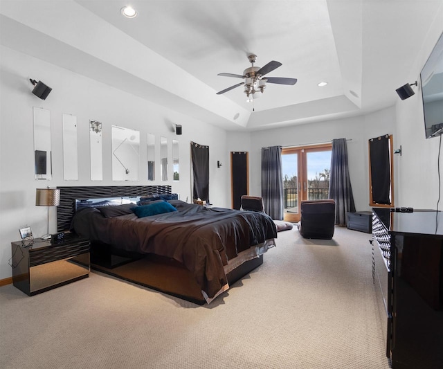 1495 Cattail Ln, Fond Du Lac, WI 54937 - carpeted bedroom featuring a raised ceiling, a fireplace, baseboards, and recessed lighting