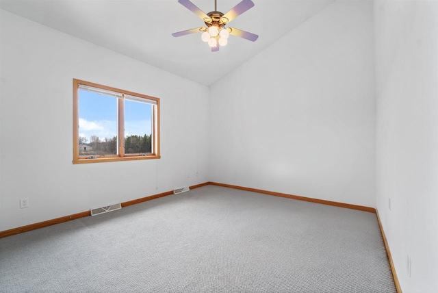 1495 Cattail Ln, Fond Du Lac, WI 54937 - unfurnished room featuring visible vents, baseboards, carpet, and vaulted ceiling
