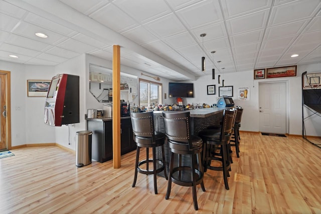 1495 Cattail Ln, Fond Du Lac, WI 54937 - bar with recessed lighting, light wood-style floors, baseboards, and a dry bar