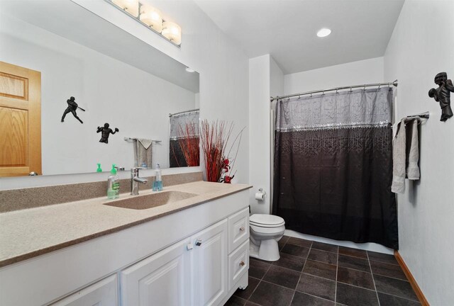 1495 Cattail Ln, Fond Du Lac, WI 54937 - full bathroom featuring tile patterned flooring, toilet, recessed lighting, and vanity