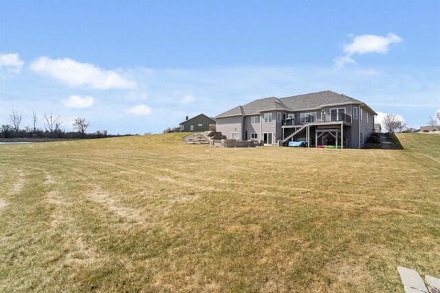 1495 Cattail Ln, Fond Du Lac, WI 54937 - view of yard featuring a wooden deck and stairs
