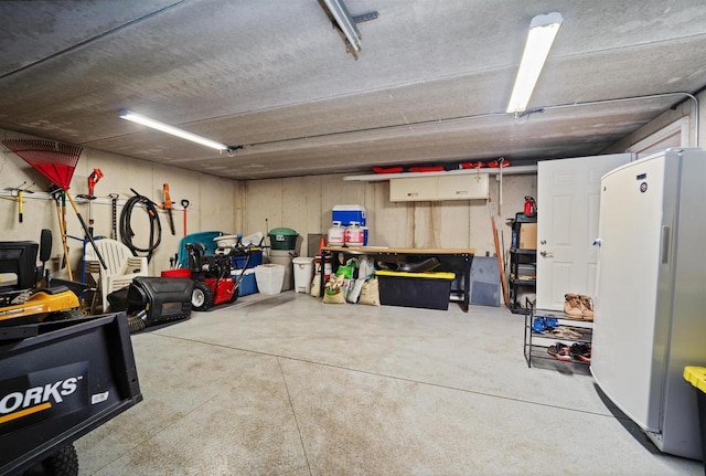1495 Cattail Ln, Fond Du Lac, WI 54937 - garage with freestanding refrigerator