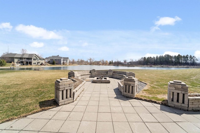 1495 Cattail Ln, Fond Du Lac, WI 54937 - view of patio featuring a water view and a fire pit