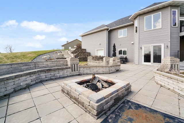 1495 Cattail Ln, Fond Du Lac, WI 54937 - view of patio with an outdoor fire pit