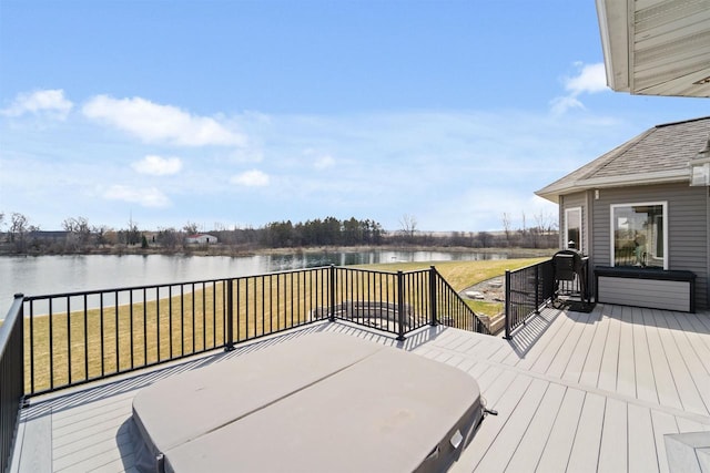 1495 Cattail Ln, Fond Du Lac, WI 54937 - wooden terrace featuring a lawn and a water view