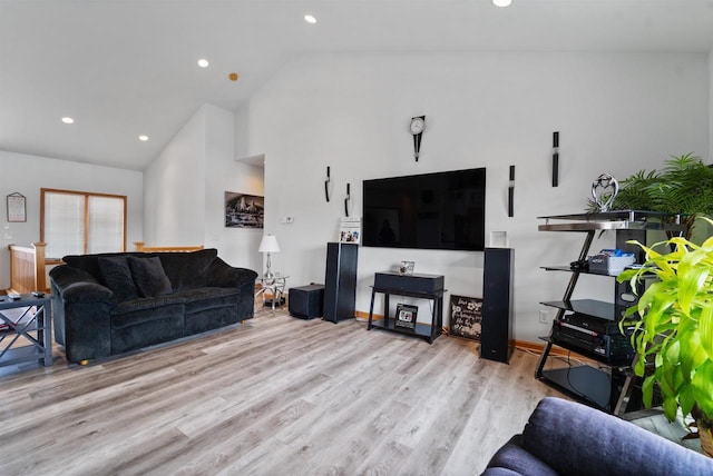 1495 Cattail Ln, Fond Du Lac, WI 54937 - living room featuring high vaulted ceiling, recessed lighting, and light wood finished floors