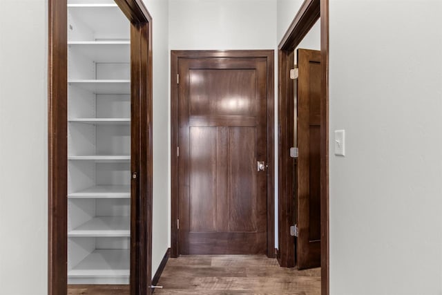 5096 N Milkweed Trl, Appleton, WI 54913 - hallway featuring wood finished floors
