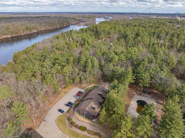 bird's eye view featuring a water view and a forest view