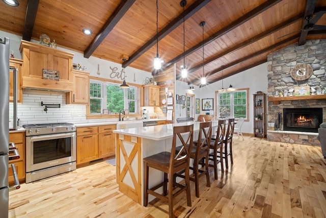 1979 9th Ave, Friendship, WI 53934 - kitchen with light countertops, light wood-style floors, stainless steel appliances, and wood ceiling