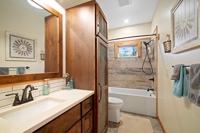 1979 9th Ave, Friendship, WI 53934 - bathroom with vanity, toilet, bathtub / shower combination, and baseboards