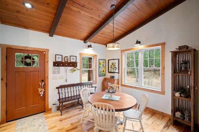 1979 9th Ave, Friendship, WI 53934 - dining space featuring beamed ceiling, high vaulted ceiling, light wood-style flooring, baseboards, and wood ceiling