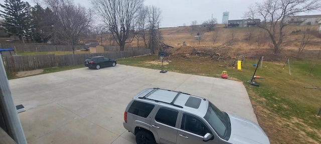 140 E Ave, Iron Ridge, WI 53035 - view of parking featuring fence