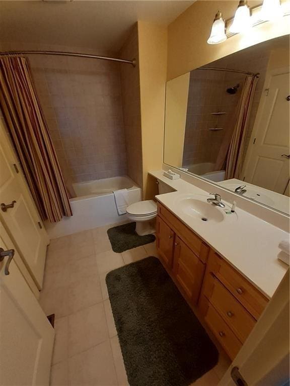 2856 29th Ave Unit 110, Birchwood, WI 54817 - bathroom with toilet, shower / tub combo with curtain, tile patterned flooring, and vanity