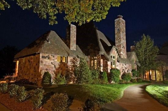 2856 29th Ave Unit 110, Birchwood, WI 54817 - exterior space with stone siding and a chimney