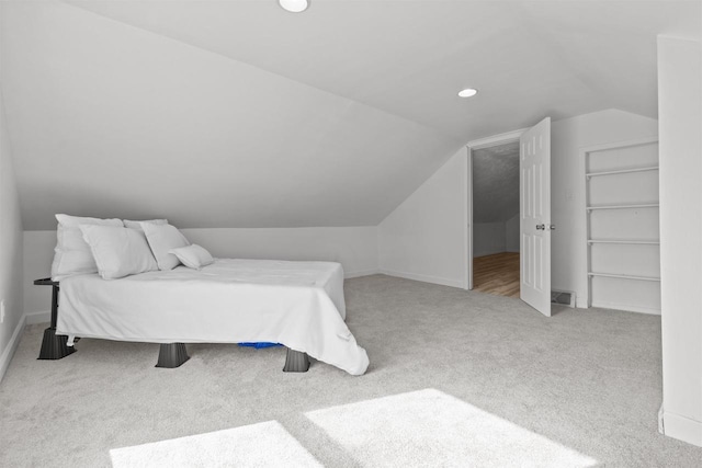 bedroom featuring baseboards, recessed lighting, carpet flooring, and lofted ceiling