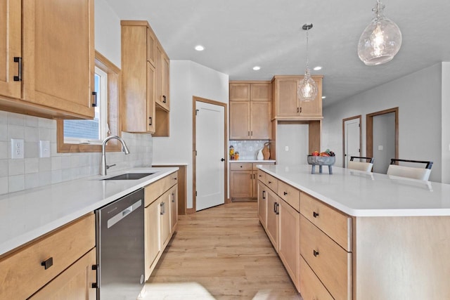 3106 Lazy Oak Dr, Green Bay, WI 54311 - kitchen featuring light wood-style floors, recessed lighting, dishwasher, a sink, and decorative backsplash