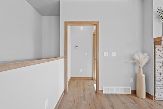 3106 Lazy Oak Dr, Green Bay, WI 54311 - hall featuring visible vents, baseboards, and wood finished floors