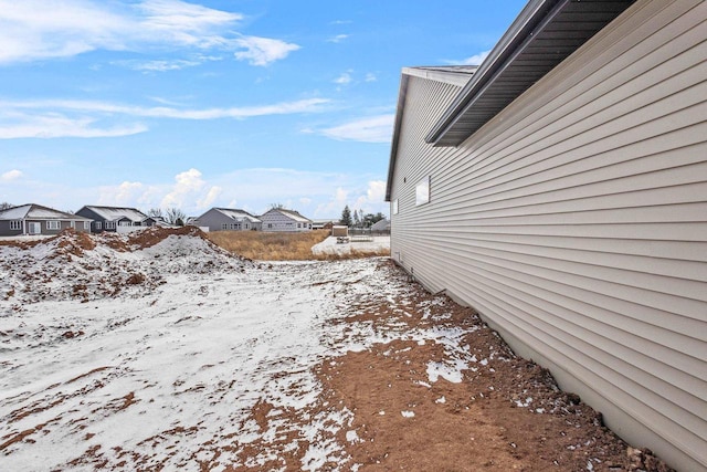 3106 Lazy Oak Dr, Green Bay, WI 54311 - snowy yard featuring a residential view