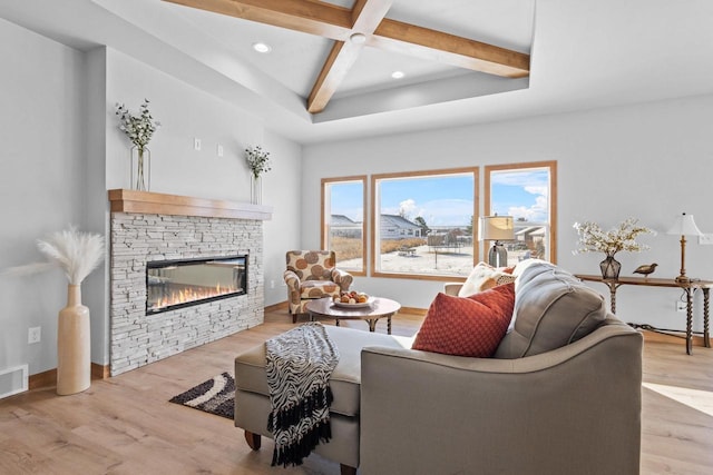 3106 Lazy Oak Dr, Green Bay, WI 54311 - living room featuring beamed ceiling, light wood-style flooring, a stone fireplace, recessed lighting, and coffered ceiling