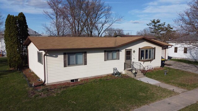 603 Mansion St, Mauston, WI 53948 - view of front facade featuring a front yard