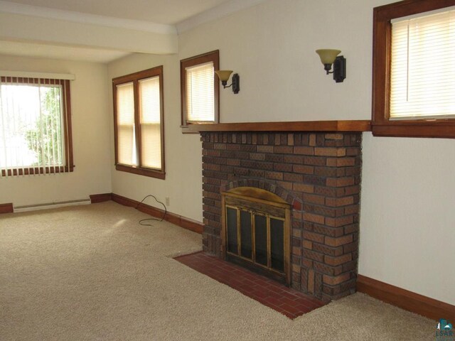1125 N 22nd St, Superior, WI 54880 - unfurnished living room with baseboards, carpet flooring, a fireplace, and baseboard heating