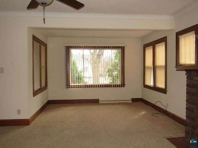 1125 N 22nd St, Superior, WI 54880 - carpeted spare room featuring a baseboard heating unit, baseboards, and a ceiling fan