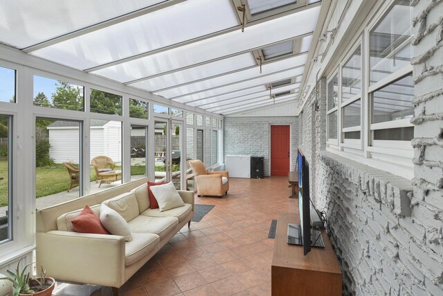 7744 2nd Ave, Kenosha, WI 53143 - sunroom featuring outdoor lounge area, tile patterned floors, and vaulted ceiling with beams