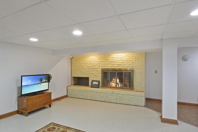 7744 2nd Ave, Kenosha, WI 53143 - living area featuring a fireplace, baseboards, and recessed lighting