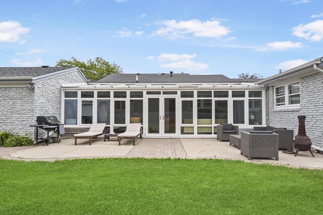 7744 2nd Ave, Kenosha, WI 53143 - back of house featuring a sunroom, a yard, a patio area, french doors, and a shingled roof