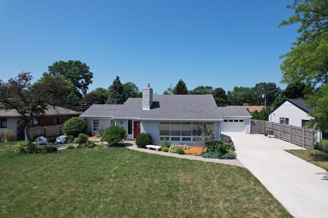 7744 2nd Ave, Kenosha, WI 53143 - ranch-style house with a garage, a chimney, fence, concrete driveway, and a front lawn