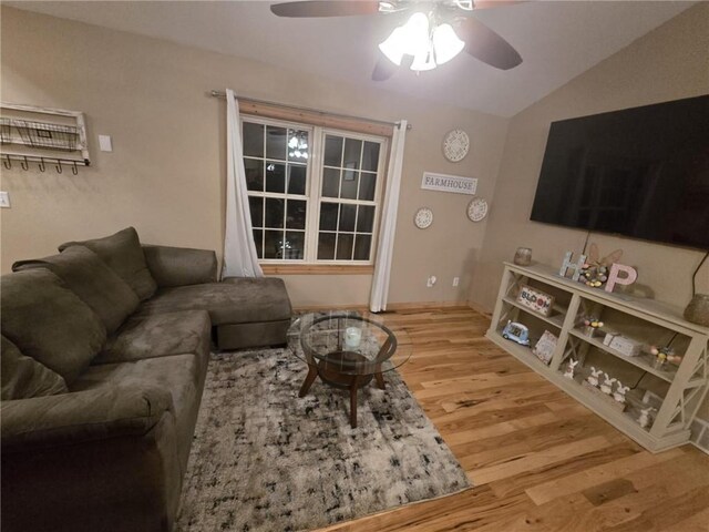 E8577 N County Rd, Elk Mound, WI 54739 - living area with ceiling fan, wood finished floors, and lofted ceiling