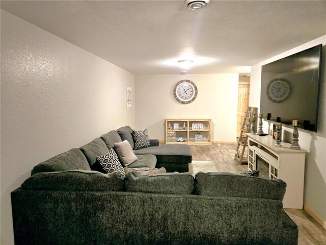 E8577 N County Rd, Elk Mound, WI 54739 - living area with baseboards and light wood finished floors