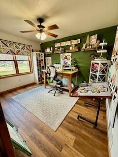 1330 Harvest Cir, Holmen, WI 54636 - office area with baseboards, ceiling fan, and wood finished floors