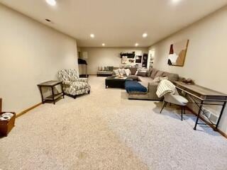1330 Harvest Cir, Holmen, WI 54636 - living area featuring carpet floors, recessed lighting, and baseboards
