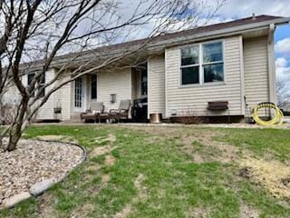 1330 Harvest Cir, Holmen, WI 54636 - back of house with a patio and a yard
