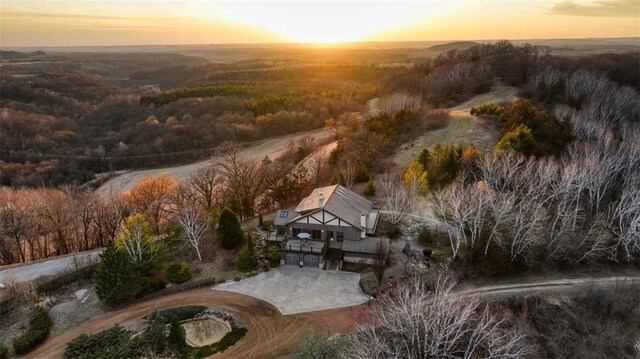 N30732 Square Bluff Rd, Blair, WI 54616 - aerial view at dusk featuring a wooded view