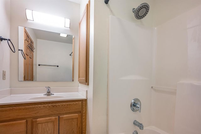 bathroom featuring vanity and shower / bathtub combination